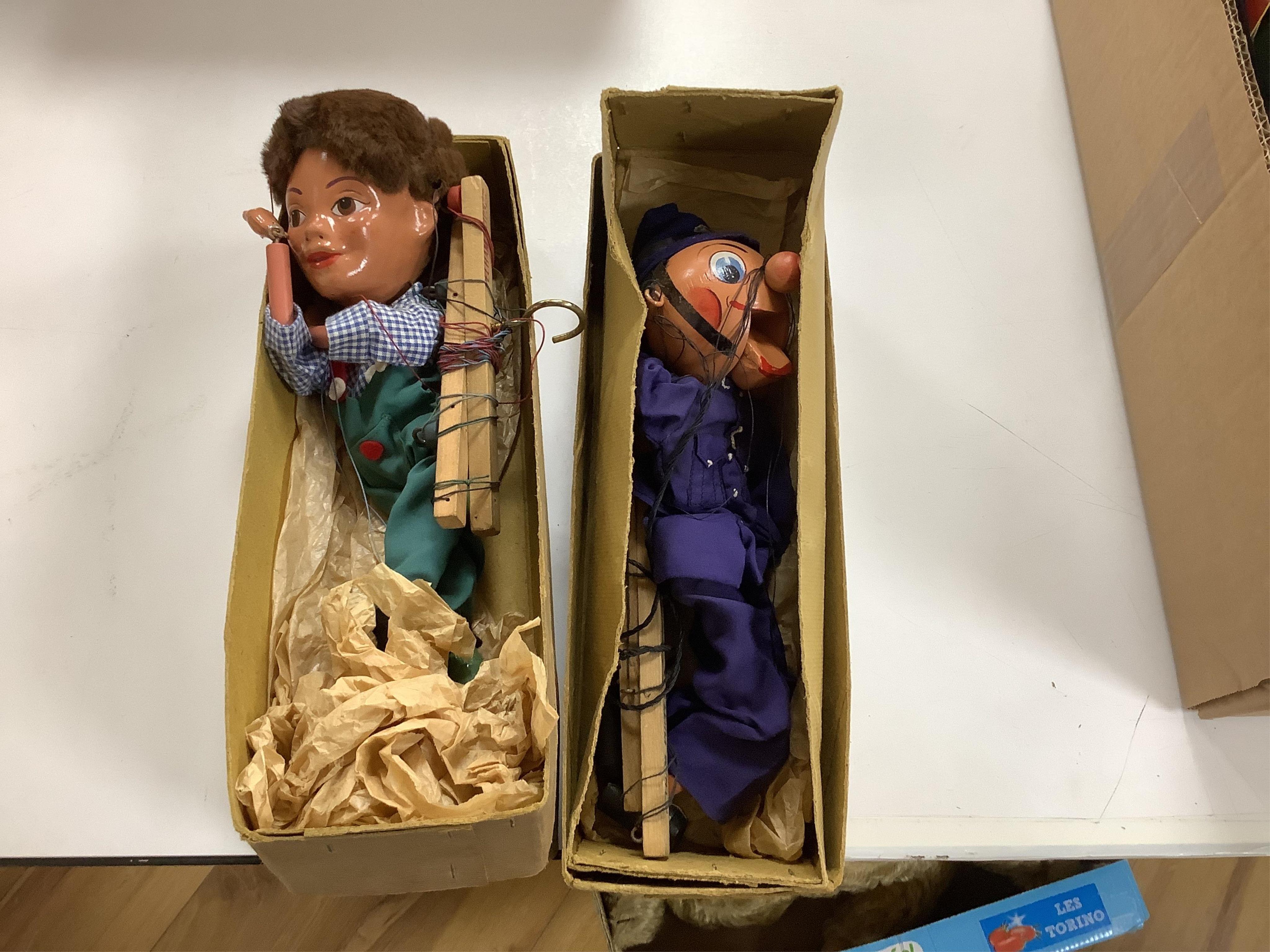 Five boxed Pelham Puppets including; a Type SL Hansel, Gretel, Bembo the Clown, the Policeman with moving mouth, Mr. Turnip